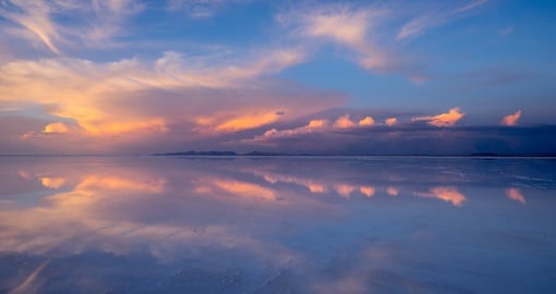 Marvel at an Uyuni sunset on your Bolivia Vacation