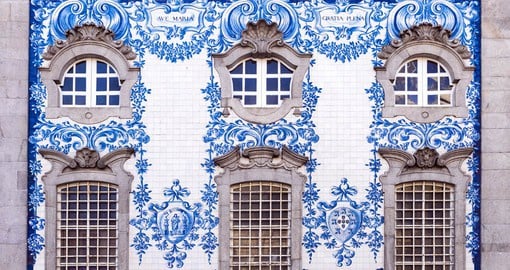 The buildings of Porto's Praca de Ribeira area are covered in glazed tiles