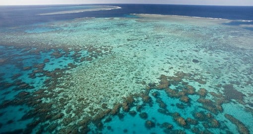 Take a boat ride or snorkel through the Great Barrier Reef in Australia during your next trip to Australia.