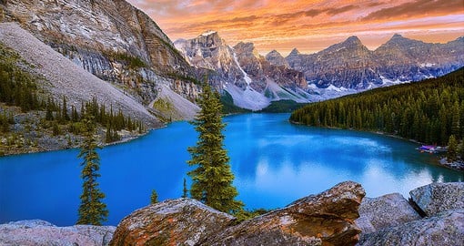 Relax by the soothing shores of Moraine Lake, a glacier-fed lake in the beautiful Banff National Park