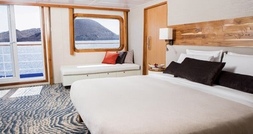 Choose the popular Balcony suite onboard the MV Legend on your Ecuador Tour