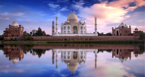 A breathtaking view of the majestic Taj Mahal during sunset in Agra