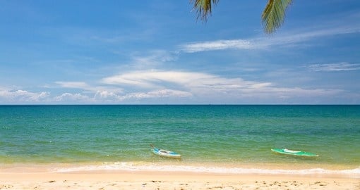 Sandy beach with canoes in Phu Quoc