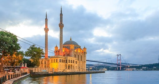 Take a walk by the stunning blue waters surrounding Istanbul and the Bosphorus Bridge