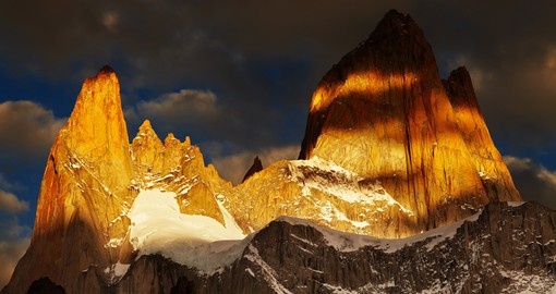 Watch a dramatic sunrise in Torres Del Paine on your Chile Vacation