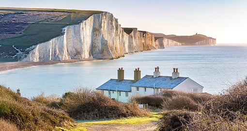 Reaching a height of 350 feet (110 m), The White Cliffs of Dover are composed of chalk