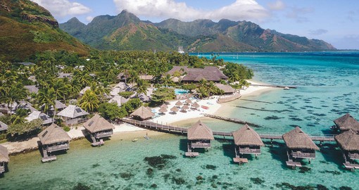 The Hilton Moorea is surrounded by the crystal-clear water of the Pacific Ocean