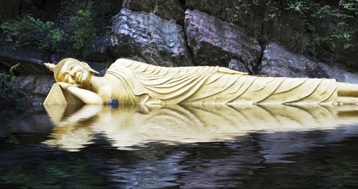 A reclining Buddha on a nearby mountaintop