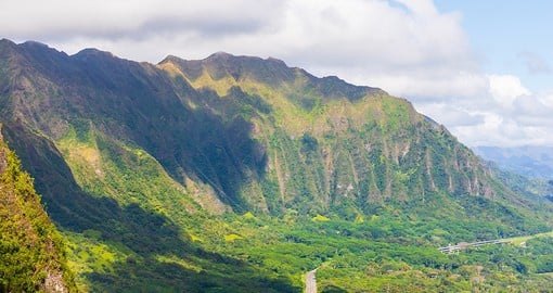Take a quick drive and walk to Nu'uanu Pali Lookout which offers an unbeatable panoramic view of the coast and cliffs
