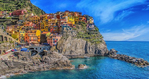The Cinque Terre, the Five Lands, is a string of fishing villages perched high on the Italian Riviera