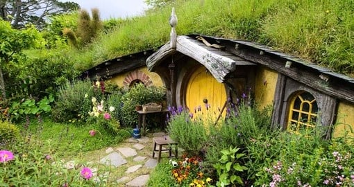 Enjoy a mix of natural beauty and a popular filming location at Hobbiton - the set of the Lord of the Rings movies during your New Zealand Vacation.