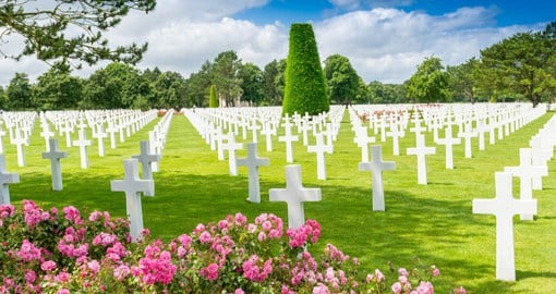 The American Cemetery near Omaha Beach has 9,386 graves marked with perfectly aligned white marble headstones