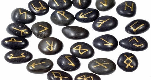 Golden Runes Carved on Icelandic Pebbles