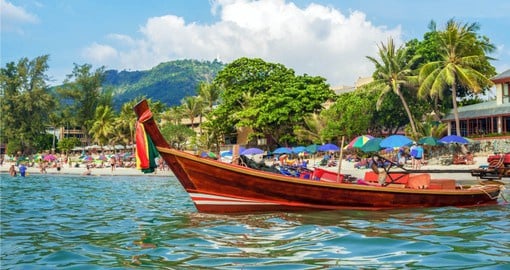 Take a traditional Thai boat on your trip to Thailand