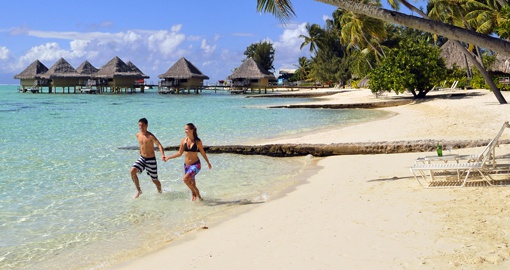 Romantic walk along the beach in Bora Bora