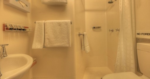 Enjoy the comforts of an en suite bathroom, featuring hairdryer and international power outlets.