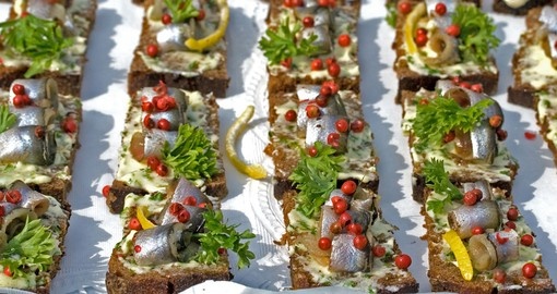 Baltic herring on slices of bread