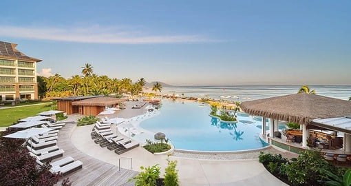 Unwind at the Hilton Tahiti Resort's large outdoor pool