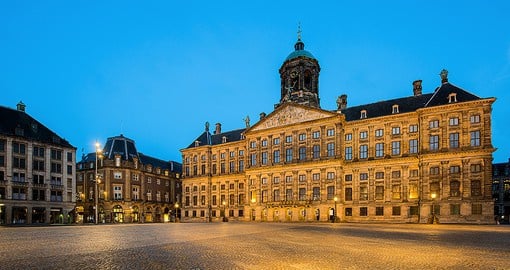 Stroll through the grounds of the Royal Palace on Dam Square, one of three residencies for use by the Dutch monarchy