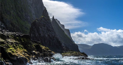 Experience the rugged Vestmanna Bird Cliffs on day 2 of your Faroe Island tour