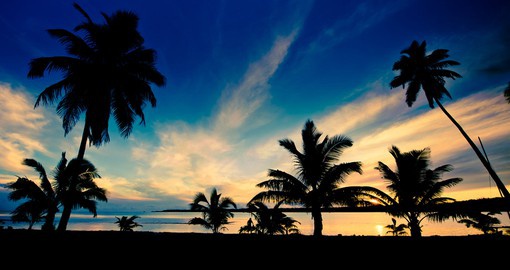 Enjoy the beautiful sunset view of the Aitutaki Lagoon on your next trip