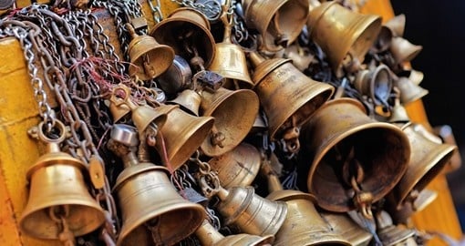 Sacrificial bells hanging on chain in Kathmandu