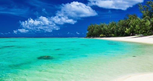 Enjoy the white sand beaches and blue lagoons of the Cook Islands