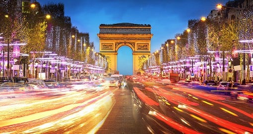 Take a trip down Avenue des Champs-Elysees to admire the Arc de Triomphe up close