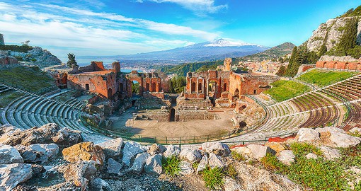 Join the leagues of history at the second largest theater in Sicily at the ruins of the Greek Theater in Taormina
