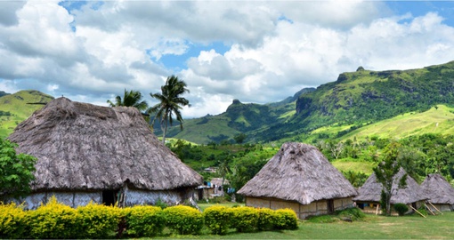 Explore the traditional Fijian bure, a wood hut with a straw roof
