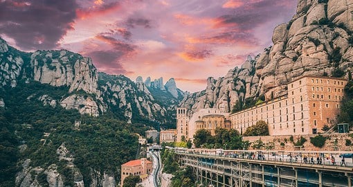 Take a day trip out of Barcelona to stop at Santa Maria de Montserrat, a stunning cliffside Monastery