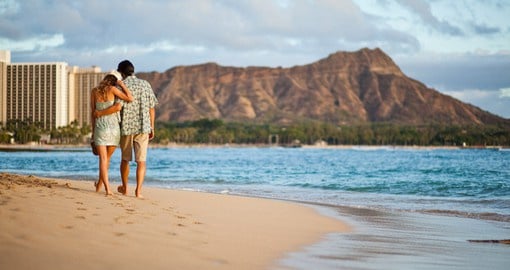 Stroll down the beautiful Waikiki beach in Oahu on your next Trip to Hawaii