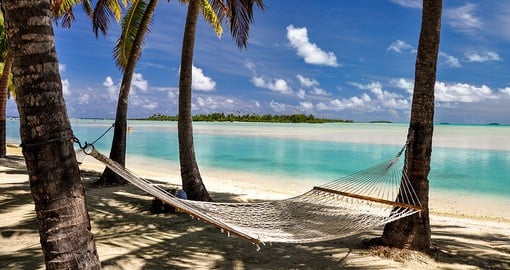 Bask in the sun on the white sand beaches during your Trips to Cook Islands.