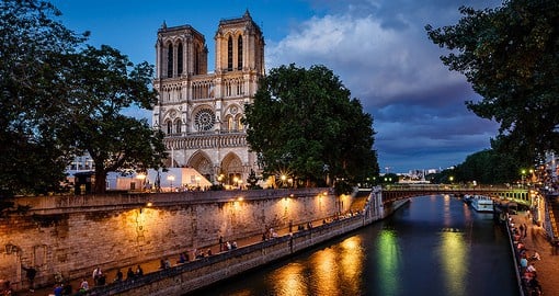 Appreciate the work behind the gothic architecture of Notre Dame de Paris