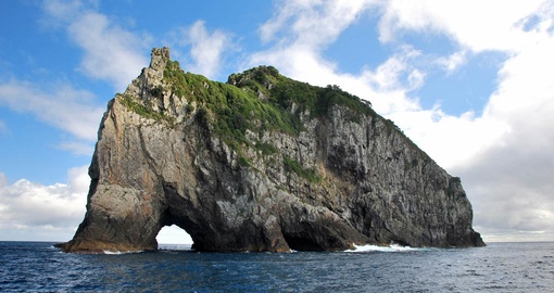 Sail around some of the Bay of Islands most historically significant spots on your New Zealand Vacation