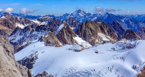 Venture to the top of Mt Titlis, known for hosting the world's first revolving cable car
