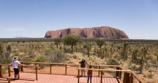 Visit Uluru and explore the surrounding area during your Australia vacation.