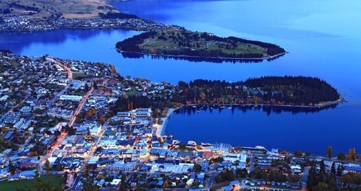 Explore aerial view of Queenstown at dusk