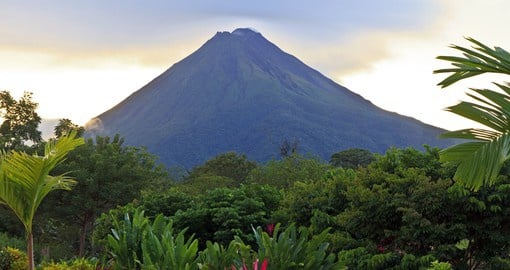 Experience tranquility at La Fortuna, Costa Rica while viewing the breathtaking Arenal volcano in the background