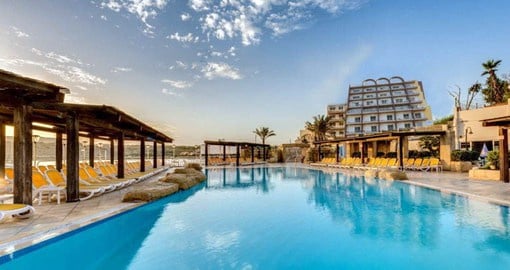 The AX Sunny Coast Resort & Spa is located in Qawra, almost touching sunny Malta’s coastline