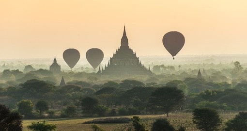 Hot-air balloons flying over the temples