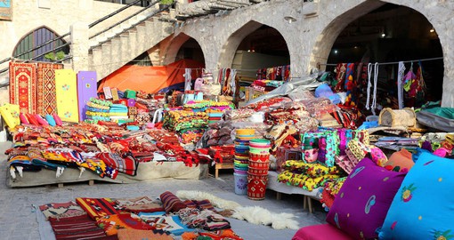 Doha's Souq Waqif is a traditional market, know for it's colourful textiles