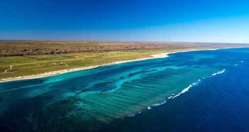 Aerial view of Ningaloo Reef and Cape Range National Park. Image courtesy of Tourism Western Australia