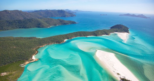 Find the perfect colour combination with the white sands, blue waters, and green forests of the Whitsunday Islands