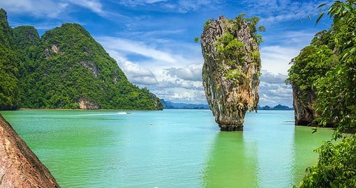 Take a winning shot at Phang Nga Bay, known for picturesque waters, sands, caverns, and rocks
