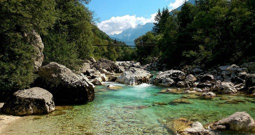 A stunning view of the peaceful emerald green Soca River