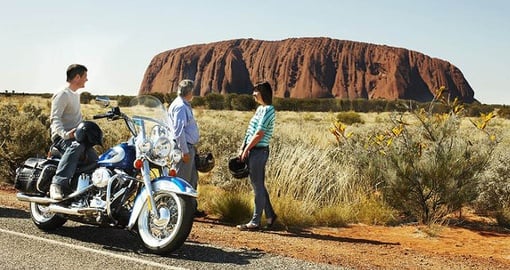 Experience the thrill of a ride on a Harley as you rush towards an unforgettable sunrise on your Australia Vacation