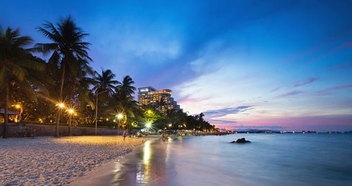 Walk the beach for a glowing sunset on the sands of Hua Hin