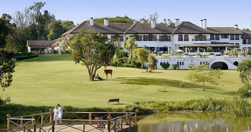 The Fairmont Mount Kenya Safari Club's main structure reflects traditional colonial architecture