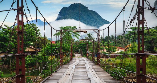Journey into the lush forest and mountain regions surrounding Vang Vieng